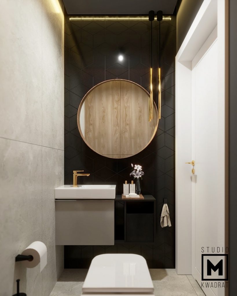 projekt wnętrza luksusowej toalety w stylu glamour ze złotymi dodatkami i czarnym wykończeniem-min