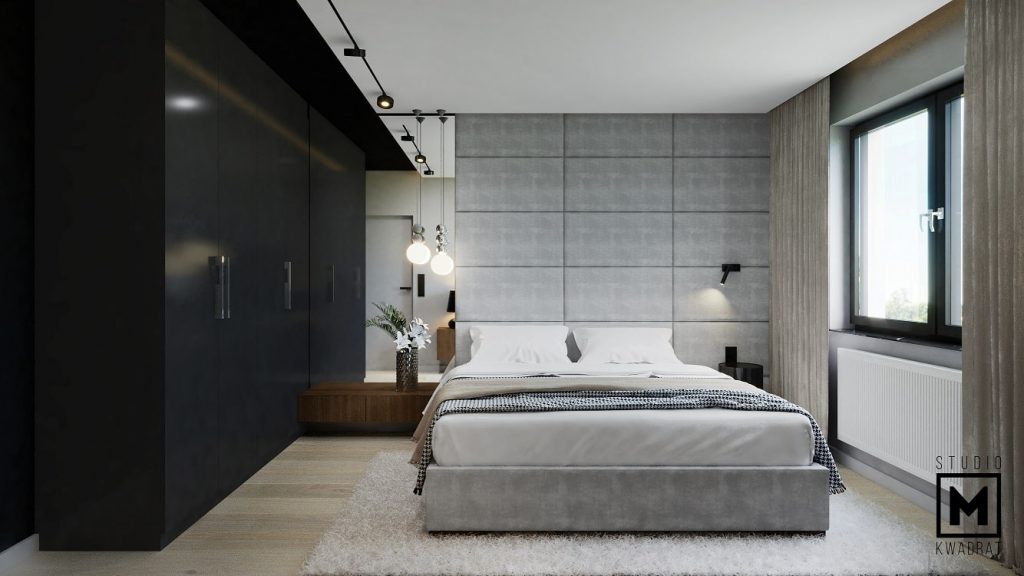 projekt nowoczesnej sypialni z dużym tapicerowanym zagłówkiem i czarną zabudową-min